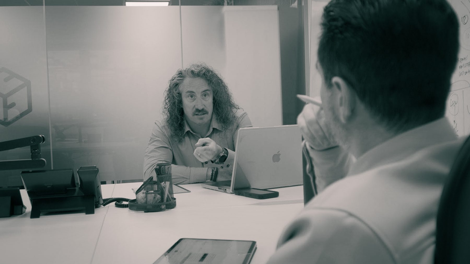 Andy Hooper in a meeting
